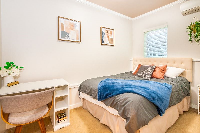Queen bedroom with desk
