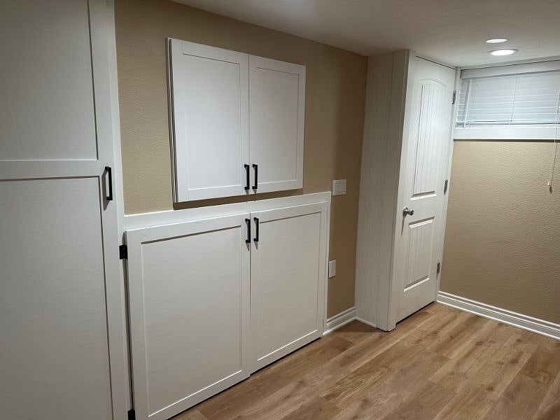 Downstairs closet and in unit W/D. W/D are shared between upstairs and downstairs unit.