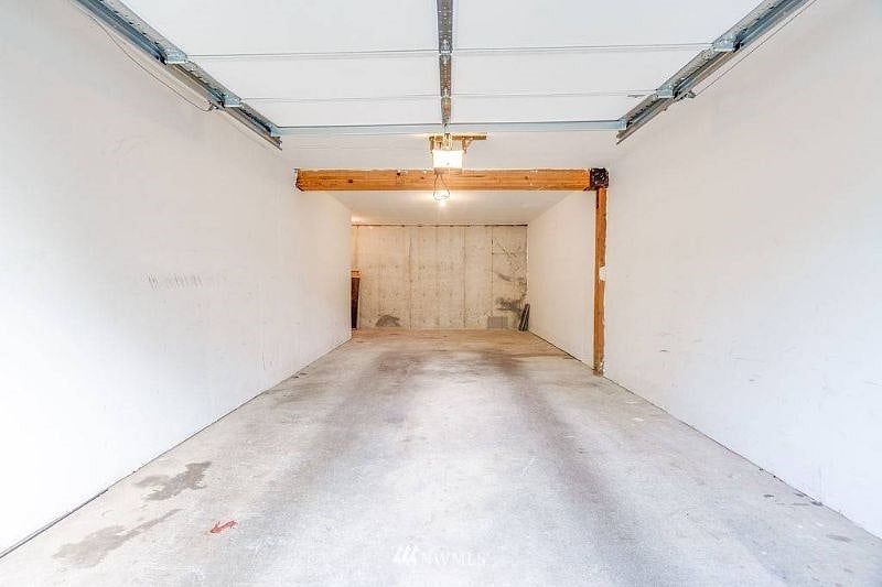 Extra long 1 car garage, with large extra space