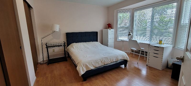 Bedroom with His & Her Closets
