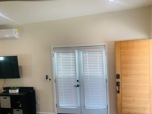 French doors lead to large backyardFull