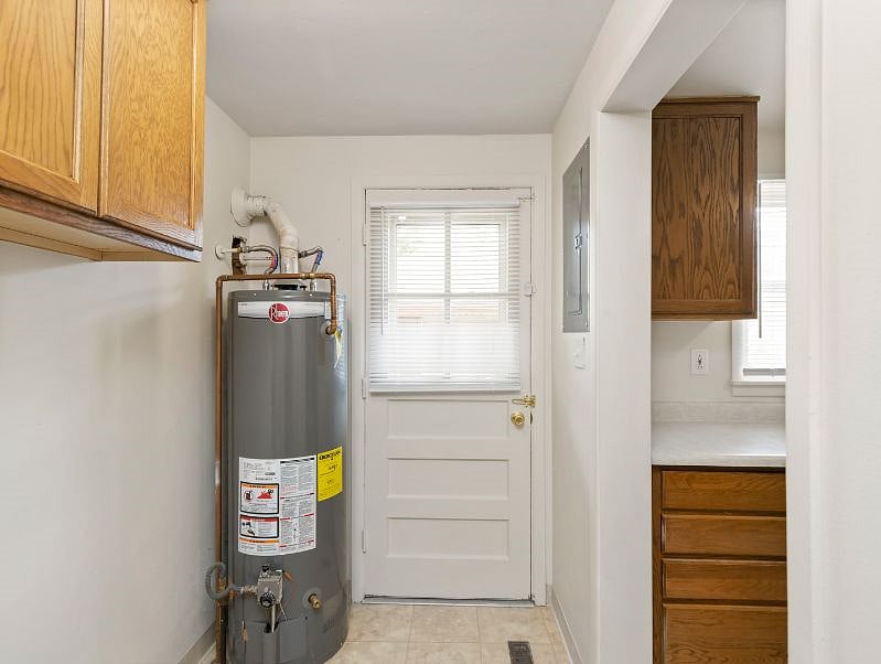 Back door off kitchen that leads to back stoop and storage shed