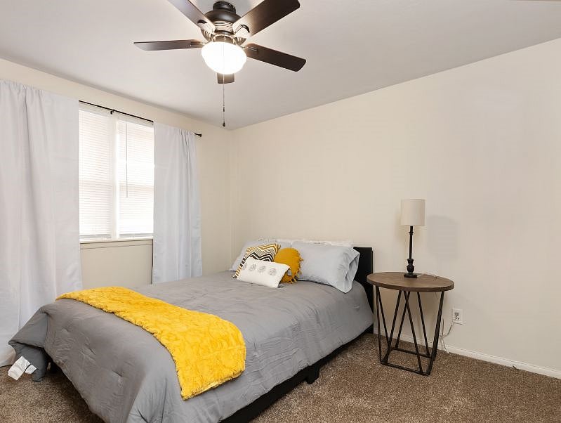 Bedroom 2. Queen bed, with new bedding, new ceiling fan, new carpet