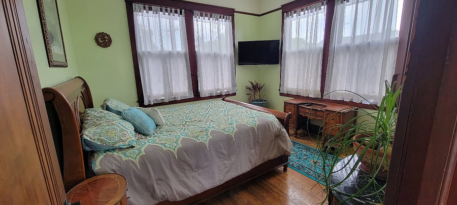 Your Bedroom with a queen-size bed.