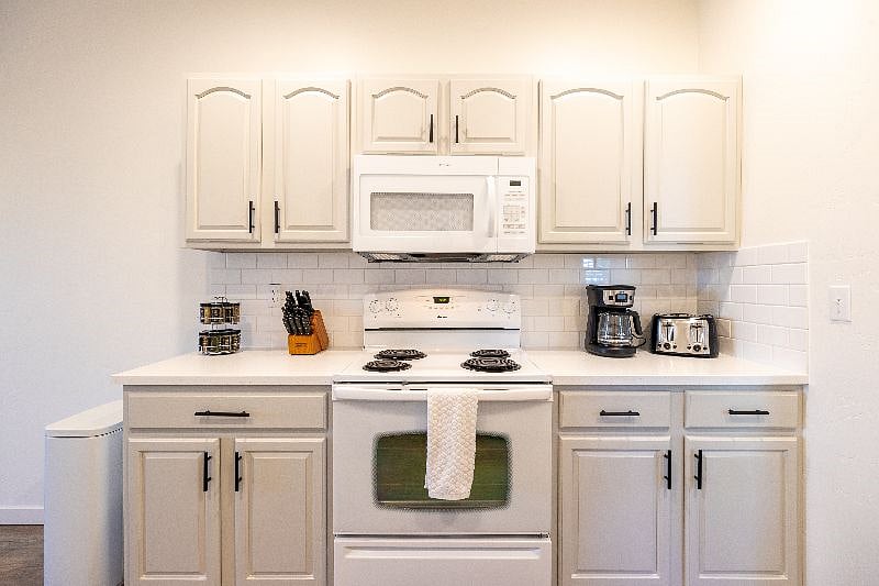 The kitchen has plenty of counter space for prepping meals