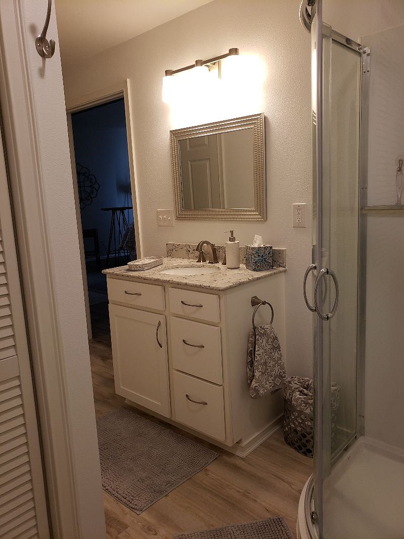 Private 3/4 bathroom. Quartz countertop.
