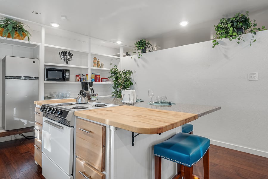 Kitchen has 3/4 fridge, microwave and coffee station.