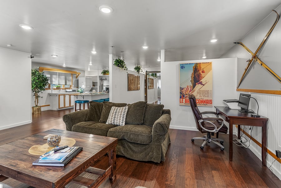This image shows the open floor plan and dedicated work area.