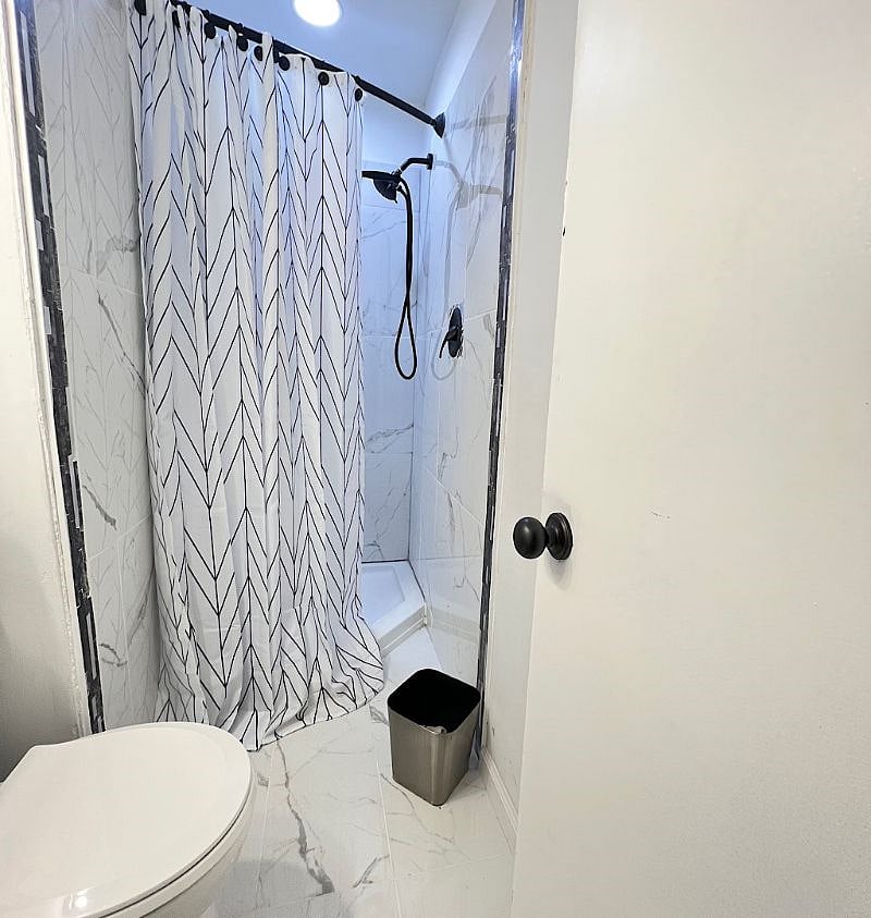 The bathroom is small, but it gets the job done.