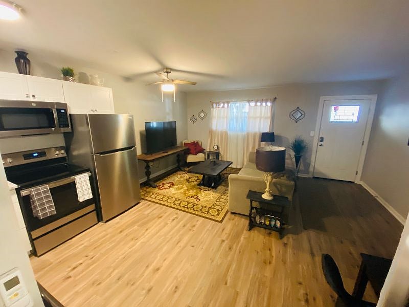 Luxury vinyl tile with 55' smart TV
