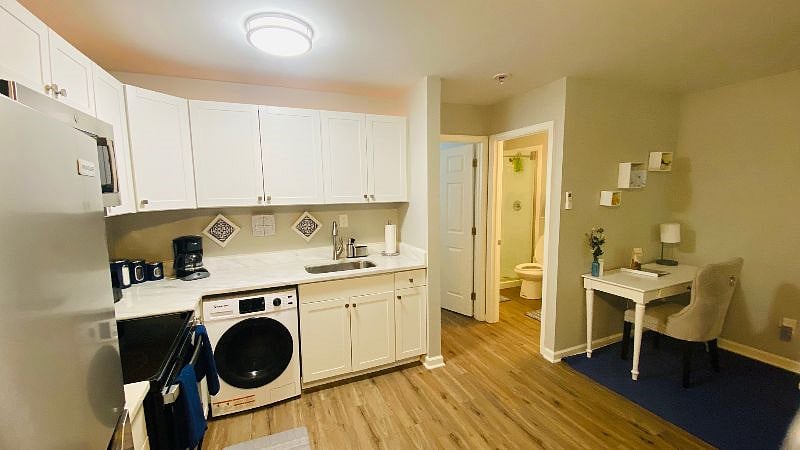 Large open kitchen with quartzite countertops! Kitchen essential provided.