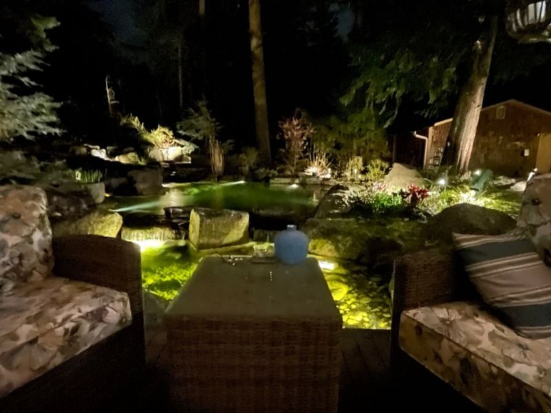 the outdoor lounge provides a great shared space to converse over cocktails, read a book by the fireplace