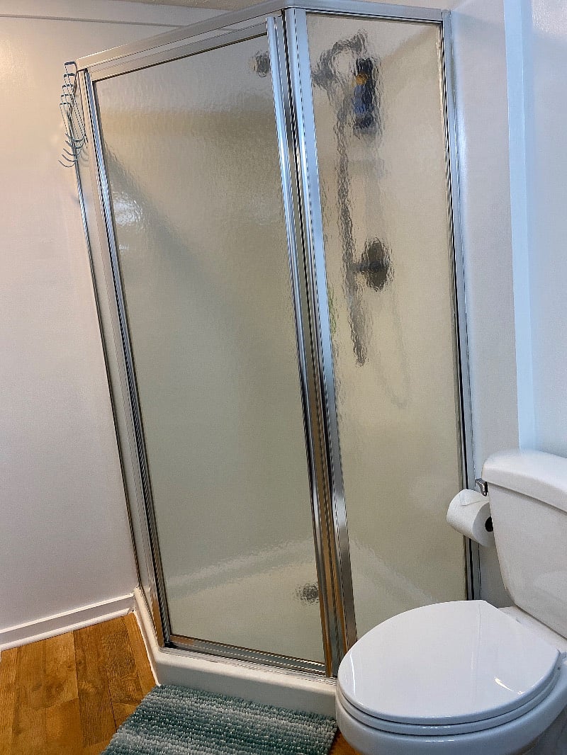 Stand-up shower with shampoo, conditioner, and body wash to get you started in your new space!