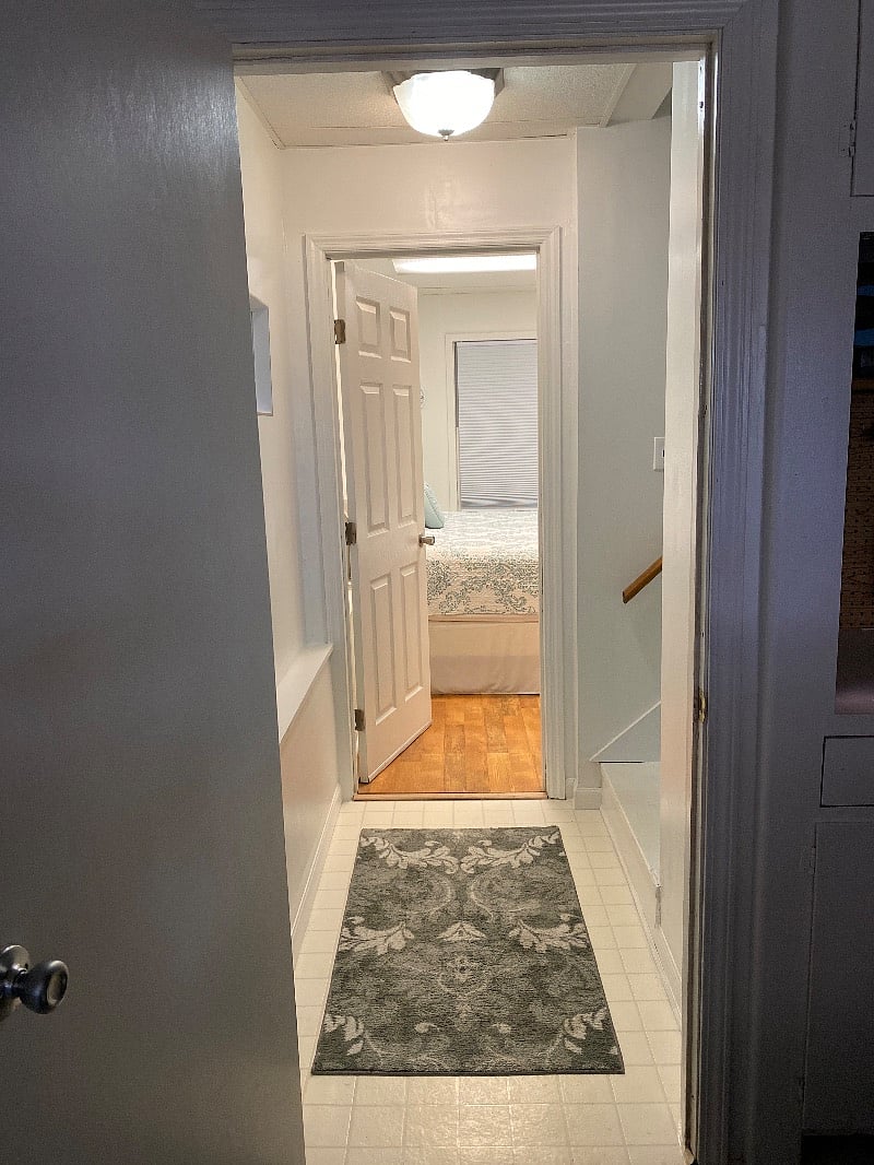 Entrance to your cozy studio apartment. This is a door that locks and there is a key for you to have so you can secure your space.