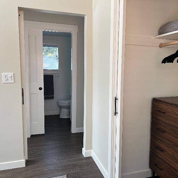 Bathroom is across the hall from the bedroom.