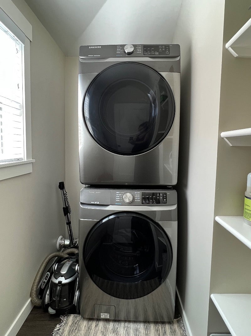 Laundry room with full-size washer and dryer.