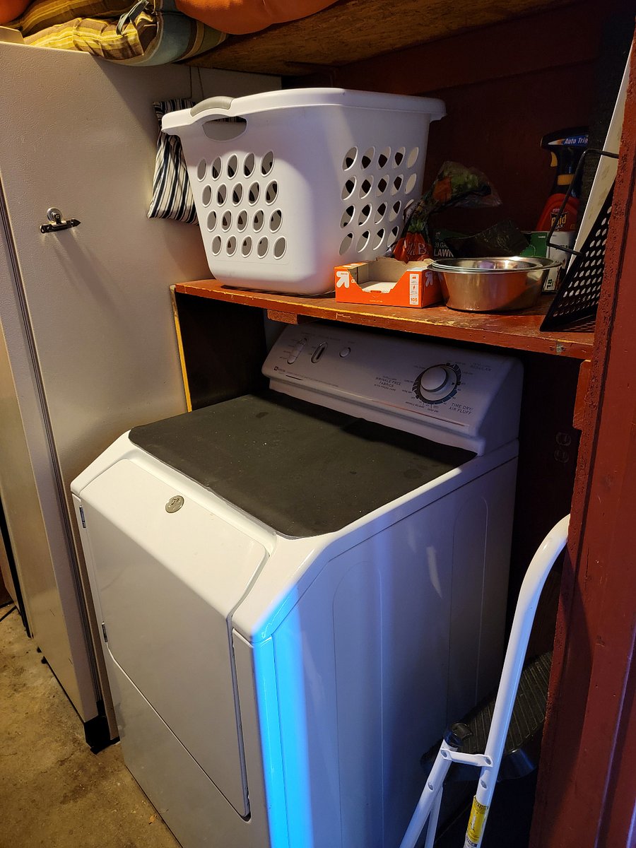 Dryer right out back door in storage shed