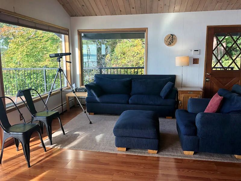 Rlax in open concept living room that flows nicely from kitchen and dining room.