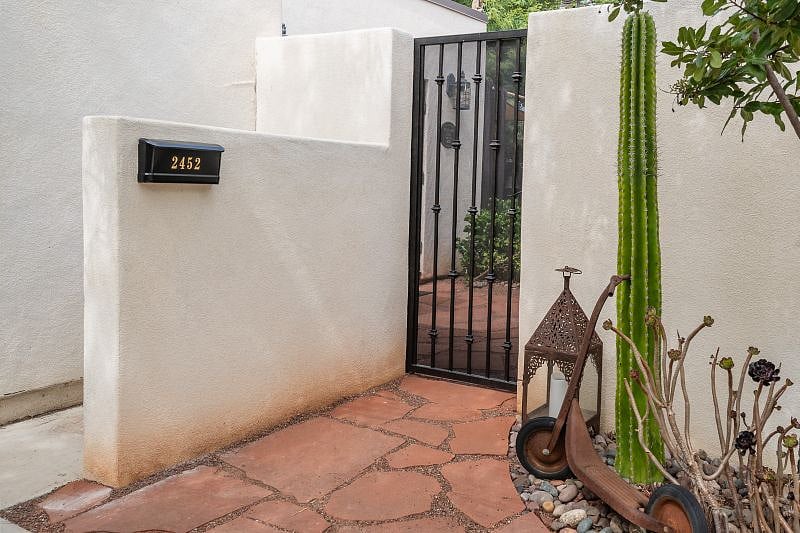 Private gated entrance and mailbox.