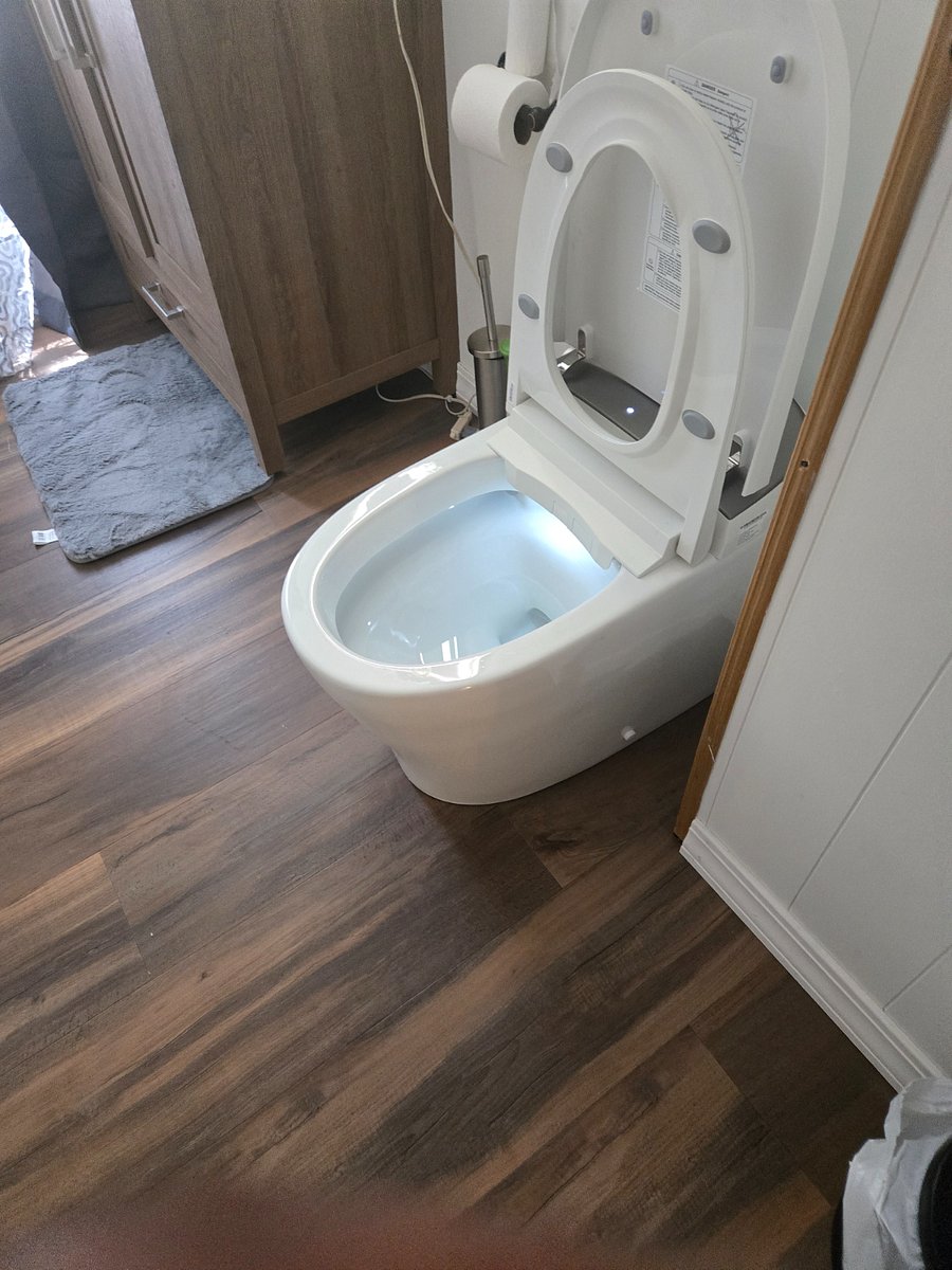 Wash your worries away in a Neat Full bathroom (toilet bidet self cleaning, sink, tub, and shower
