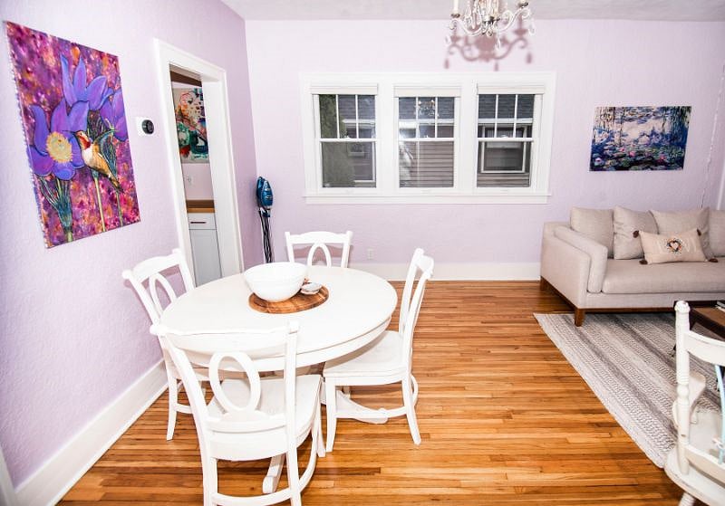 Dining space for four, with an leaf available downstairs, and two additional chairs in the kitchen pantry.