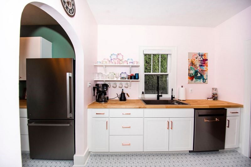 Entryway to the pantry in the left of the photo