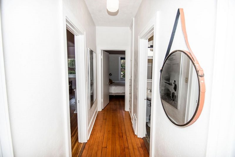 Looking down the hall to the front or primary bedroom