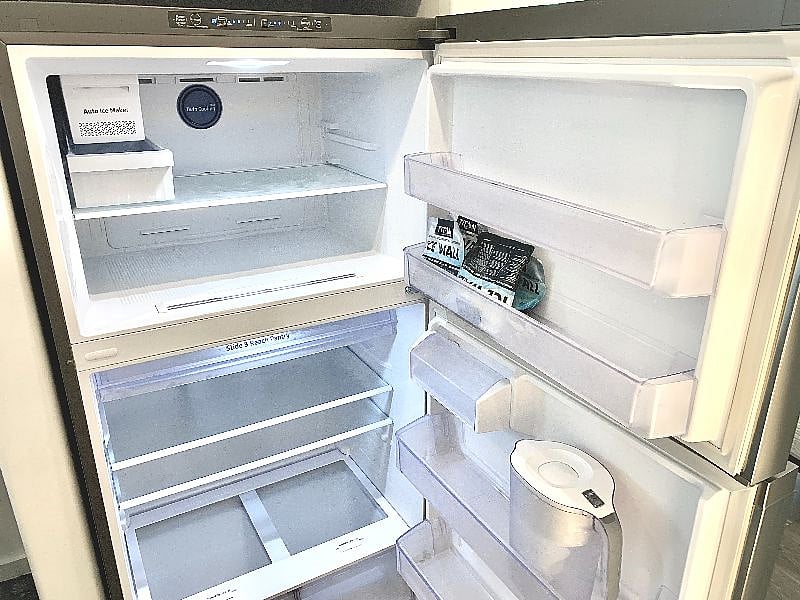 Refrigerator with ice maker and freezer
