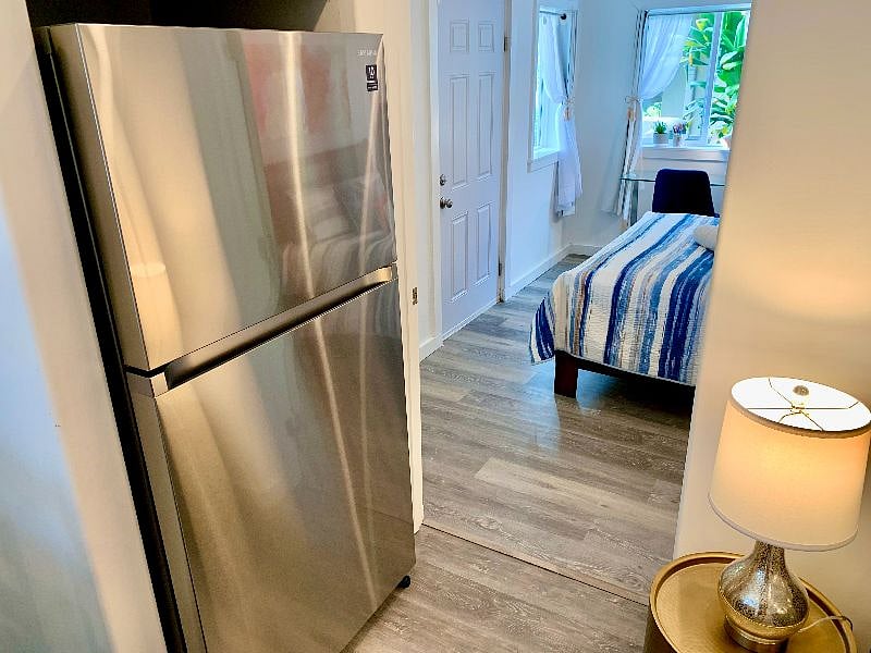 Refrigerator with ice maker and freezer