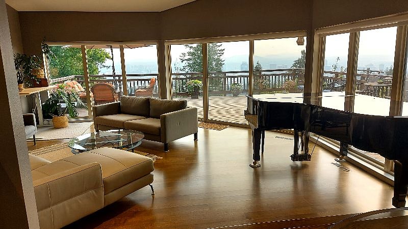 Grey couch has been moved to kitchen area (see first photo)