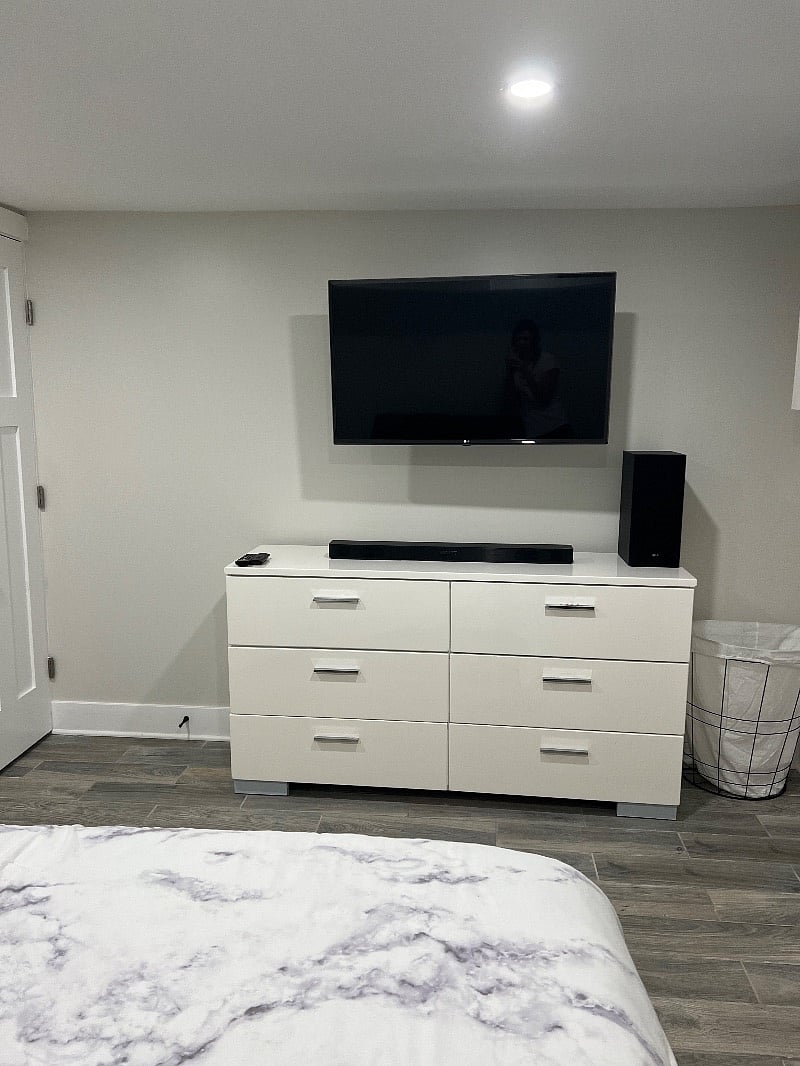 Bedroom with large smart TV/sound bar