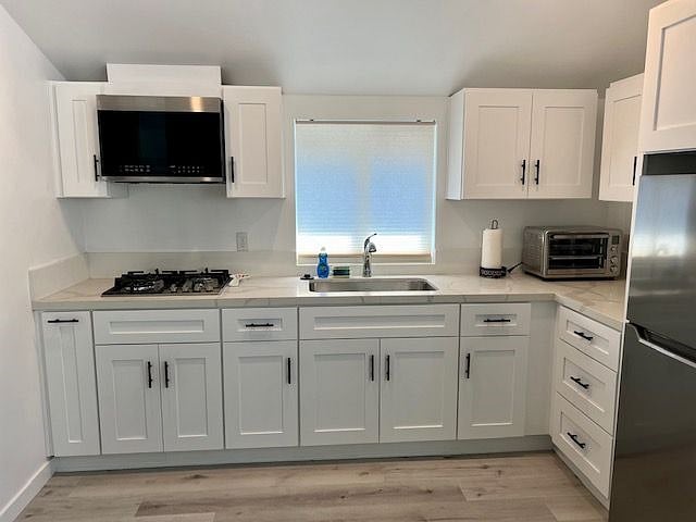Kitchen with stainless steel applicances