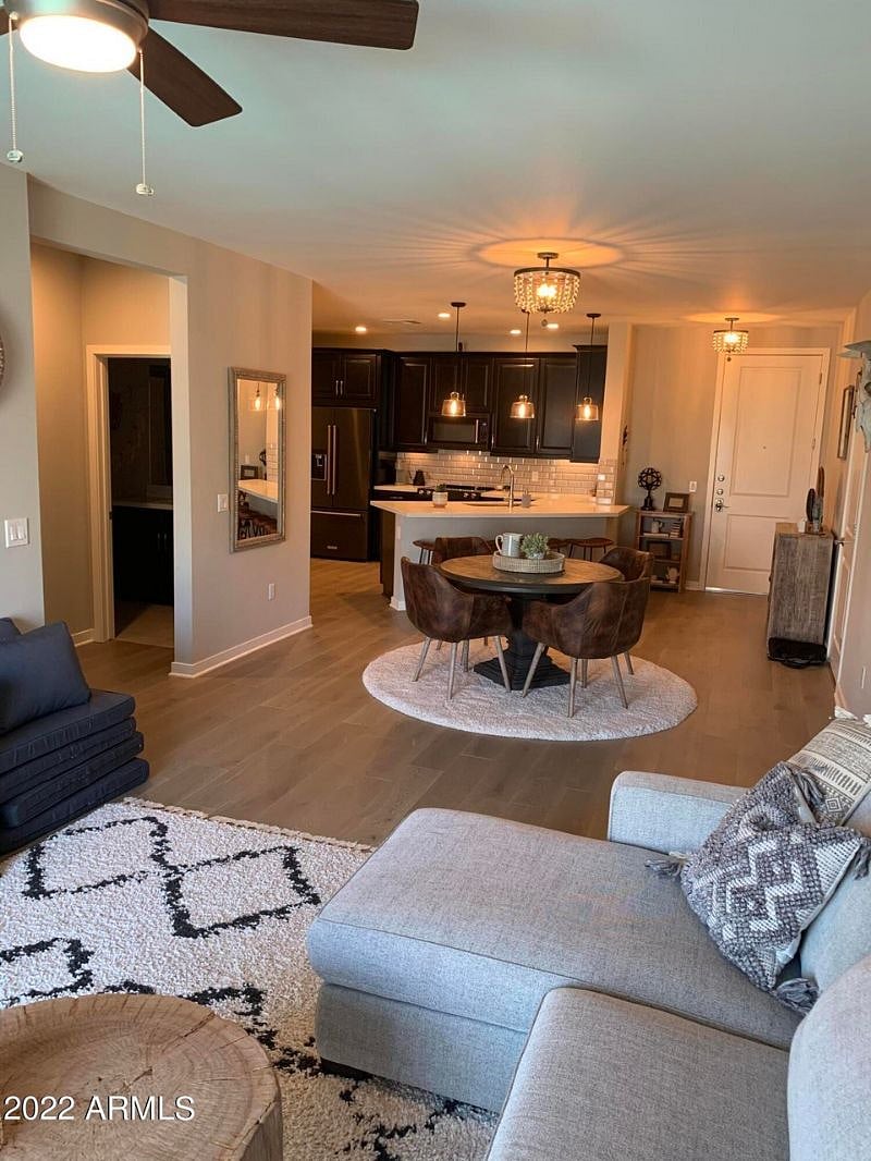 View of kitchen and dining from living room