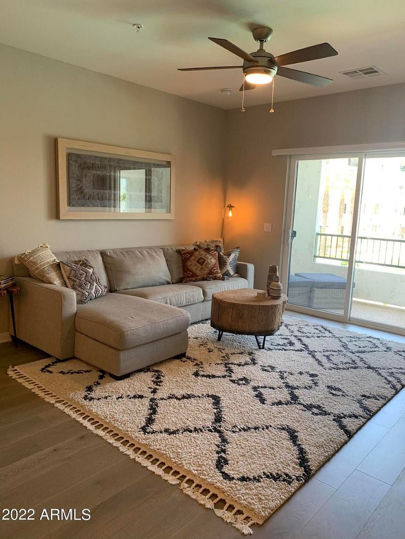 Beautiful furnishings, patio looks out into pool area