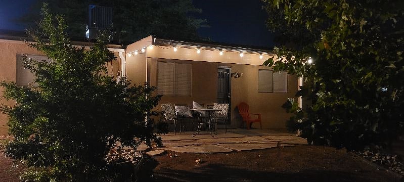 Backyard patio by night. It's perfect for all your entertaining soires