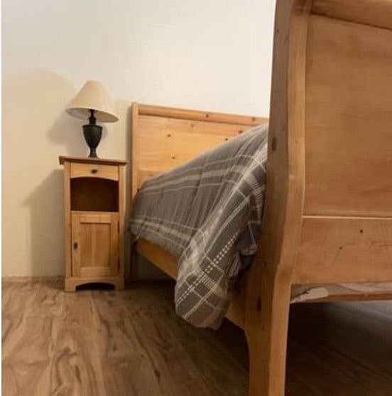 Master bed. Highlighting brand-new flooring throughout