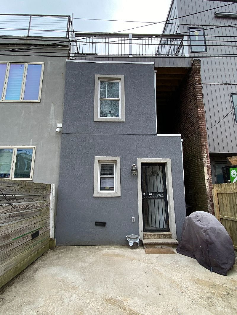Rear entrance and parking spot