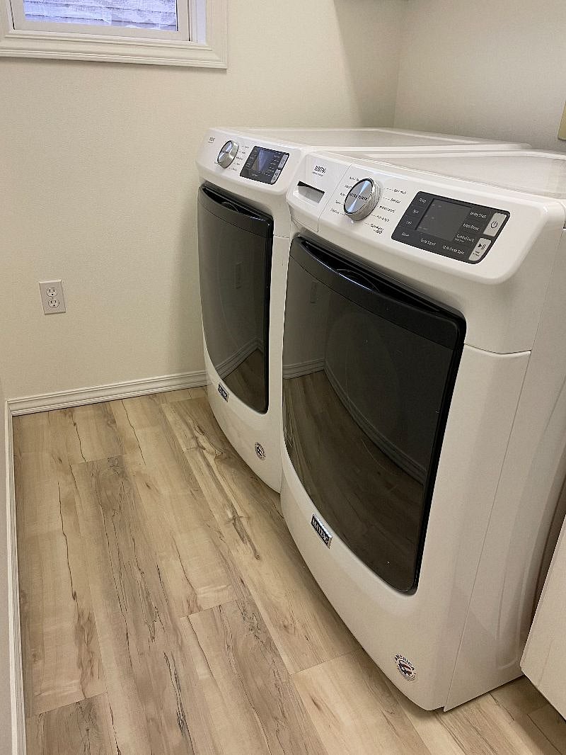 Washer and dryer located on the main level and shared with homeowners