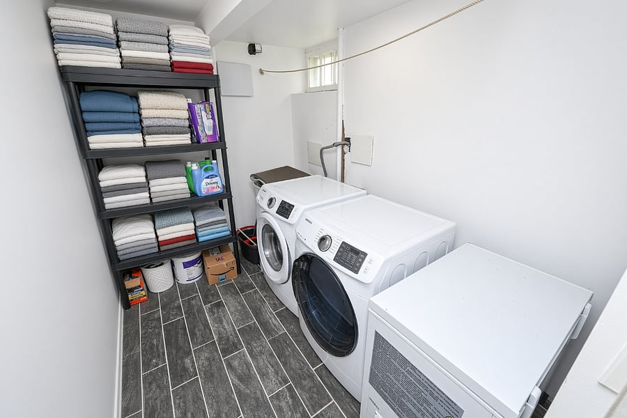Full-size washer, dryer and linen storage