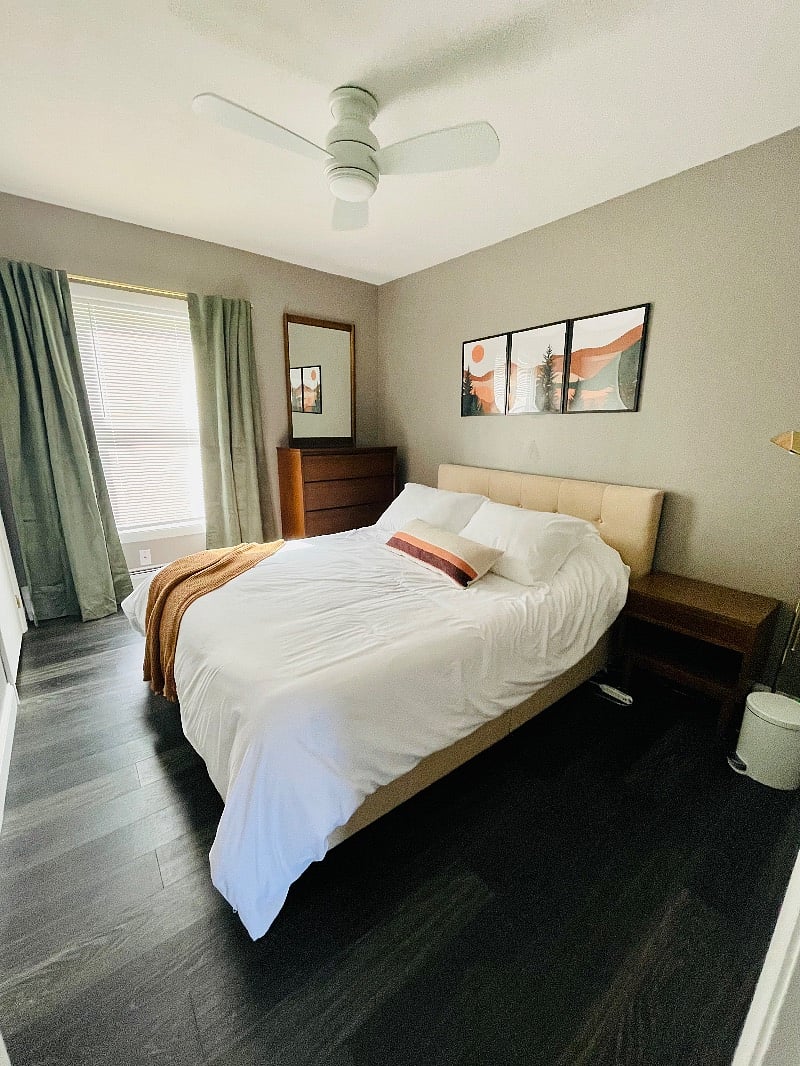 Bedroom #1 with Layla two-sided mattress, full-size dresser, mirror, nightstand and closet