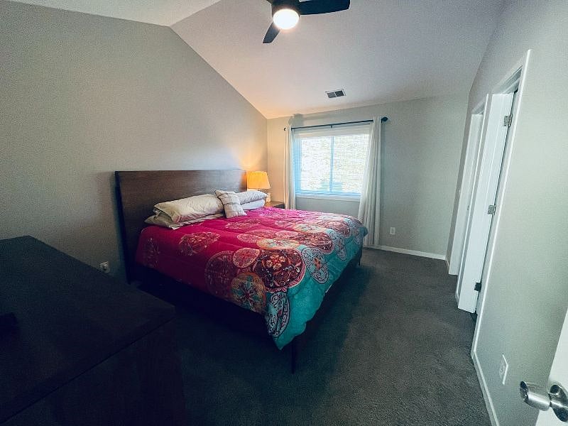 Bedroom #1: The primary bedroom features a comfortable king-size bed and a dresser.