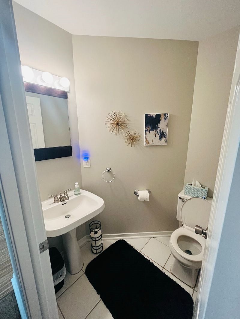 The main level has a half bathroom for easy access.