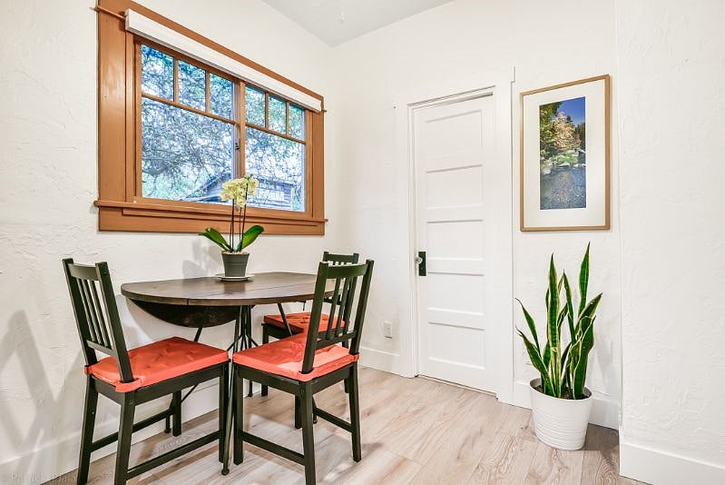 Dining area can easily seat 4 with folding chairs available as well as a desk/table in the office lounge area that can expand to hold up to 8 guests for a meal.
