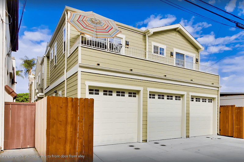 Back of 3 townhome complex