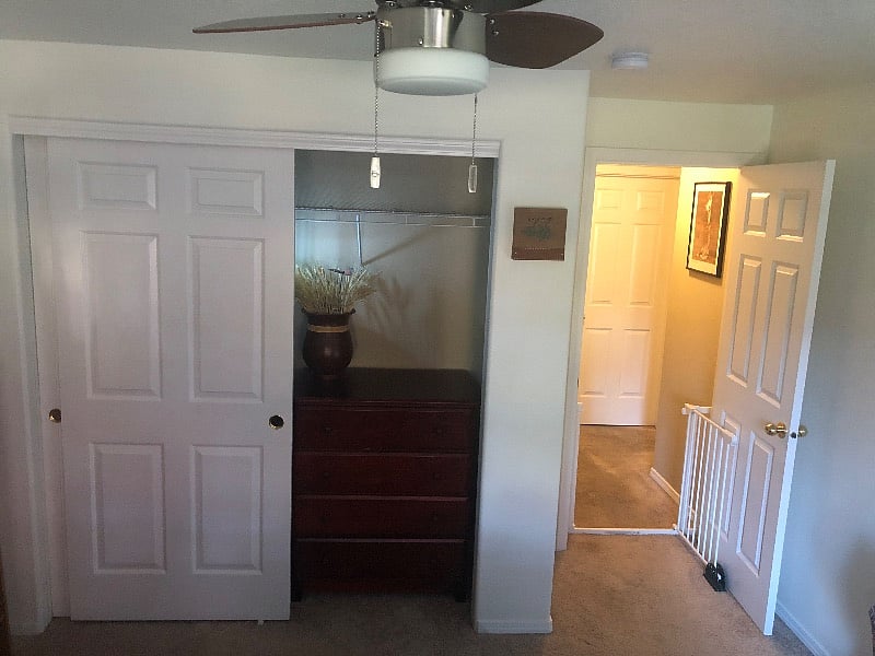 Full-size Closet with dresser that can be used in the closet or moved to the room for added hanging space.