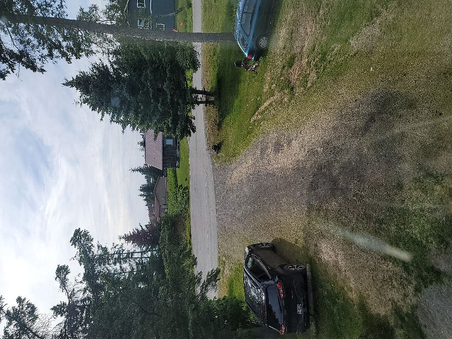 Summertime ! Plenty of parking for one extra vehicle. Lots of room to sunbathe in the private yard. Large corner lot yet bei quiet! 