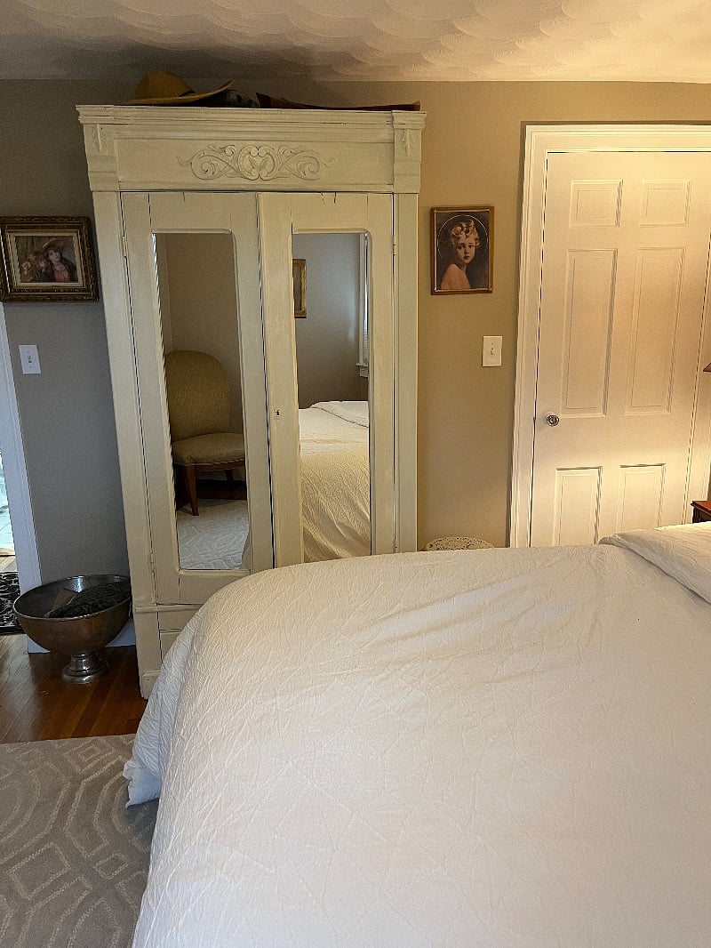 Guest bedroom armoire with closet.