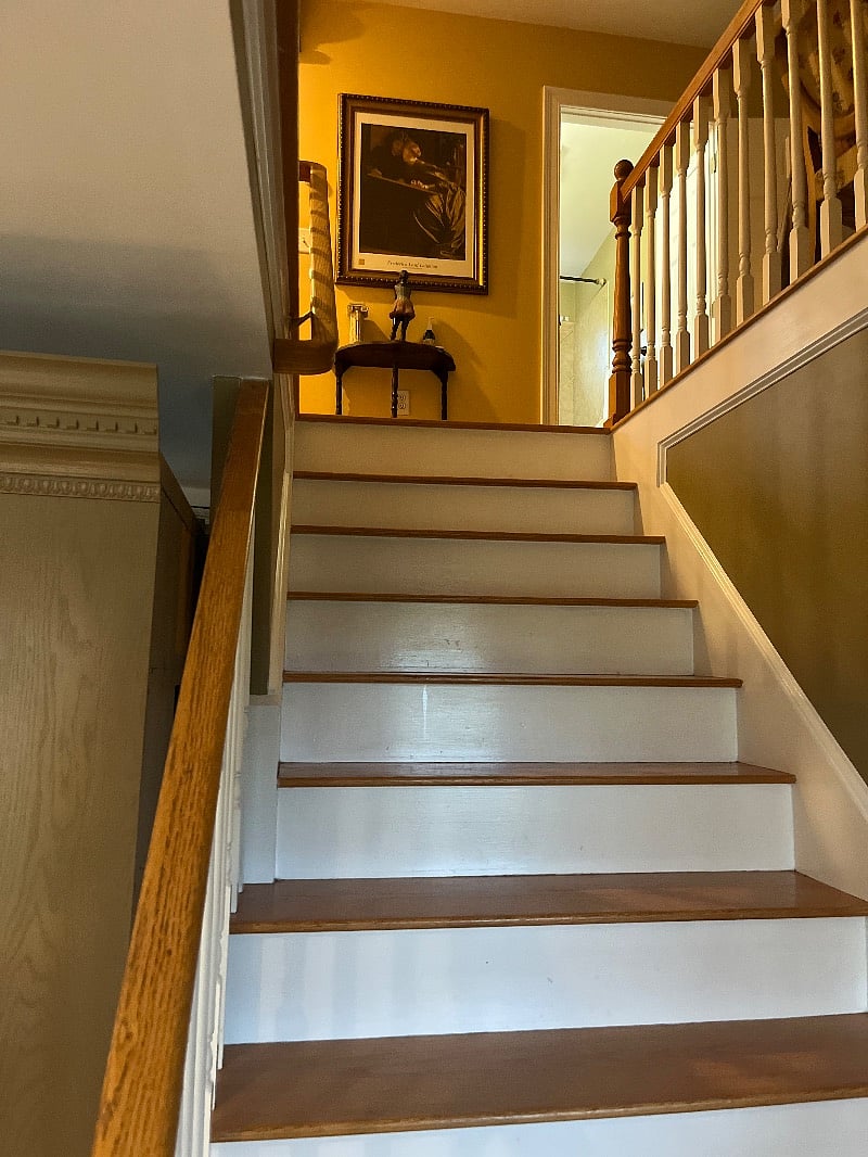 Stairs to second floor master suite.