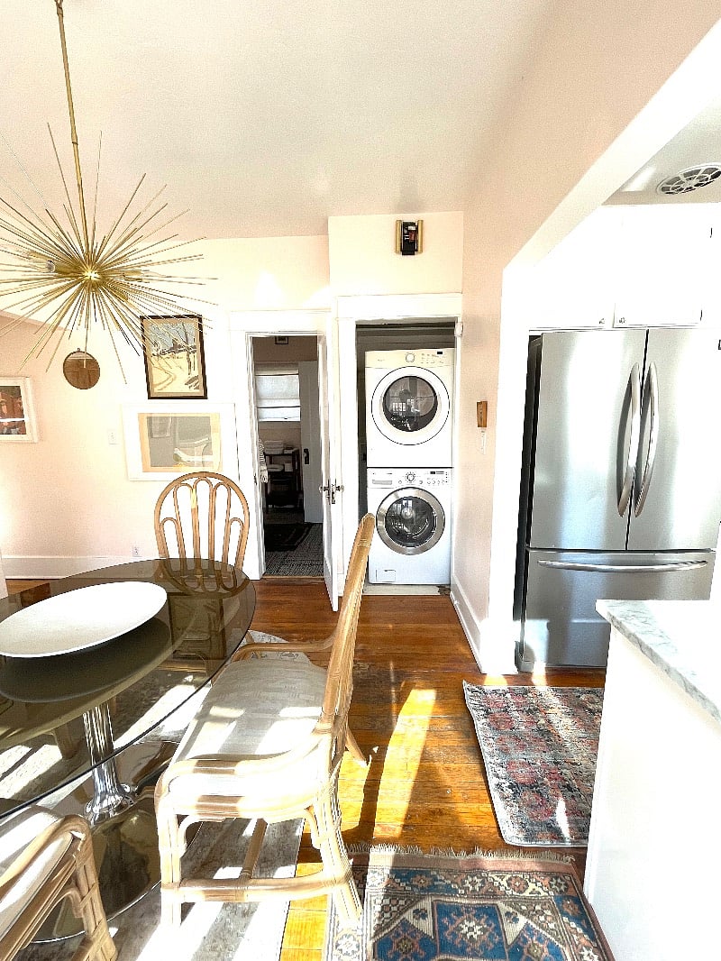 Laundry and door to bathroom 