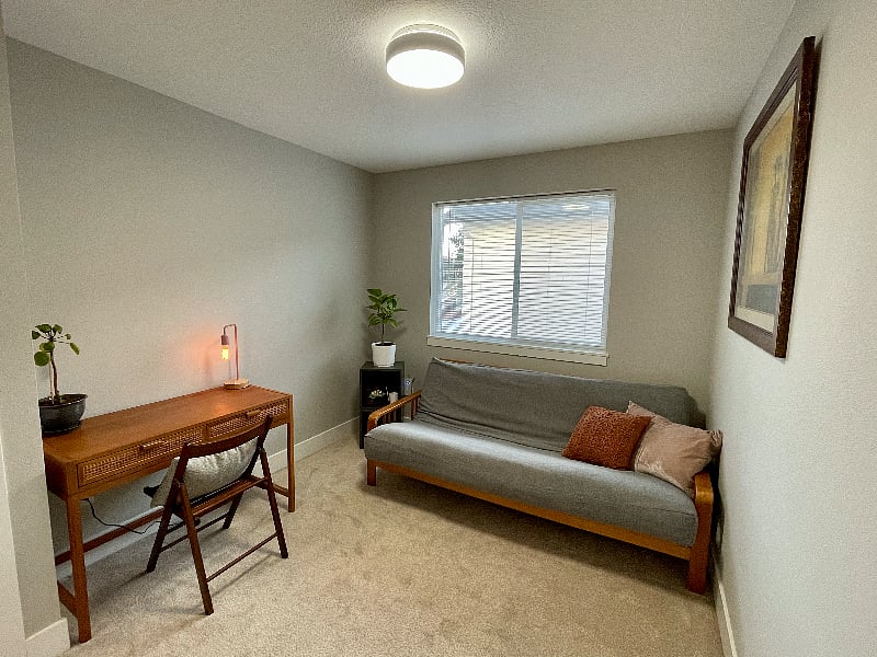 Second bedroom with full size futon and desk